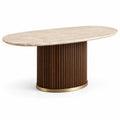 Mesa de comedor ovalada de mármol beige con base de madera y metal